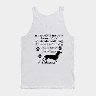 The funny dog ​​controls me its a dachshund Tank Top